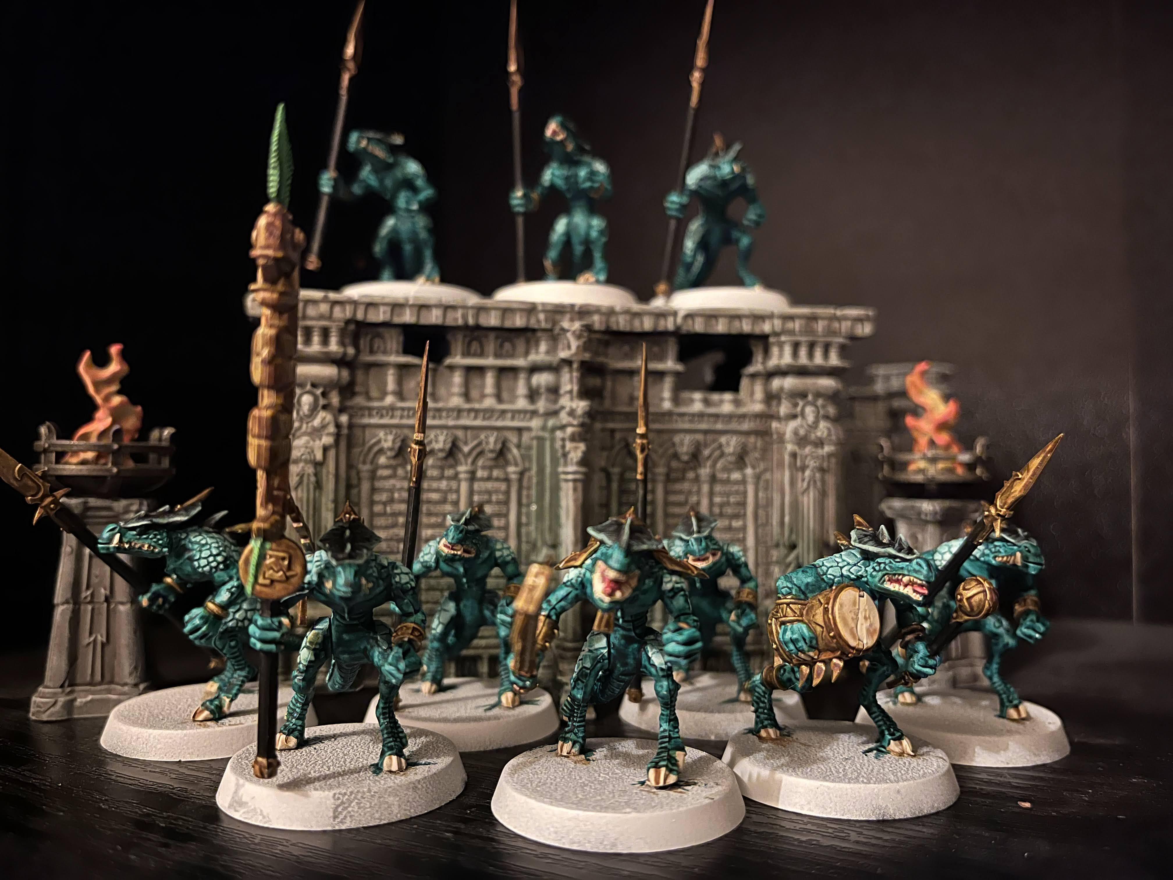"A group shot of a bunch of saurus warriors"